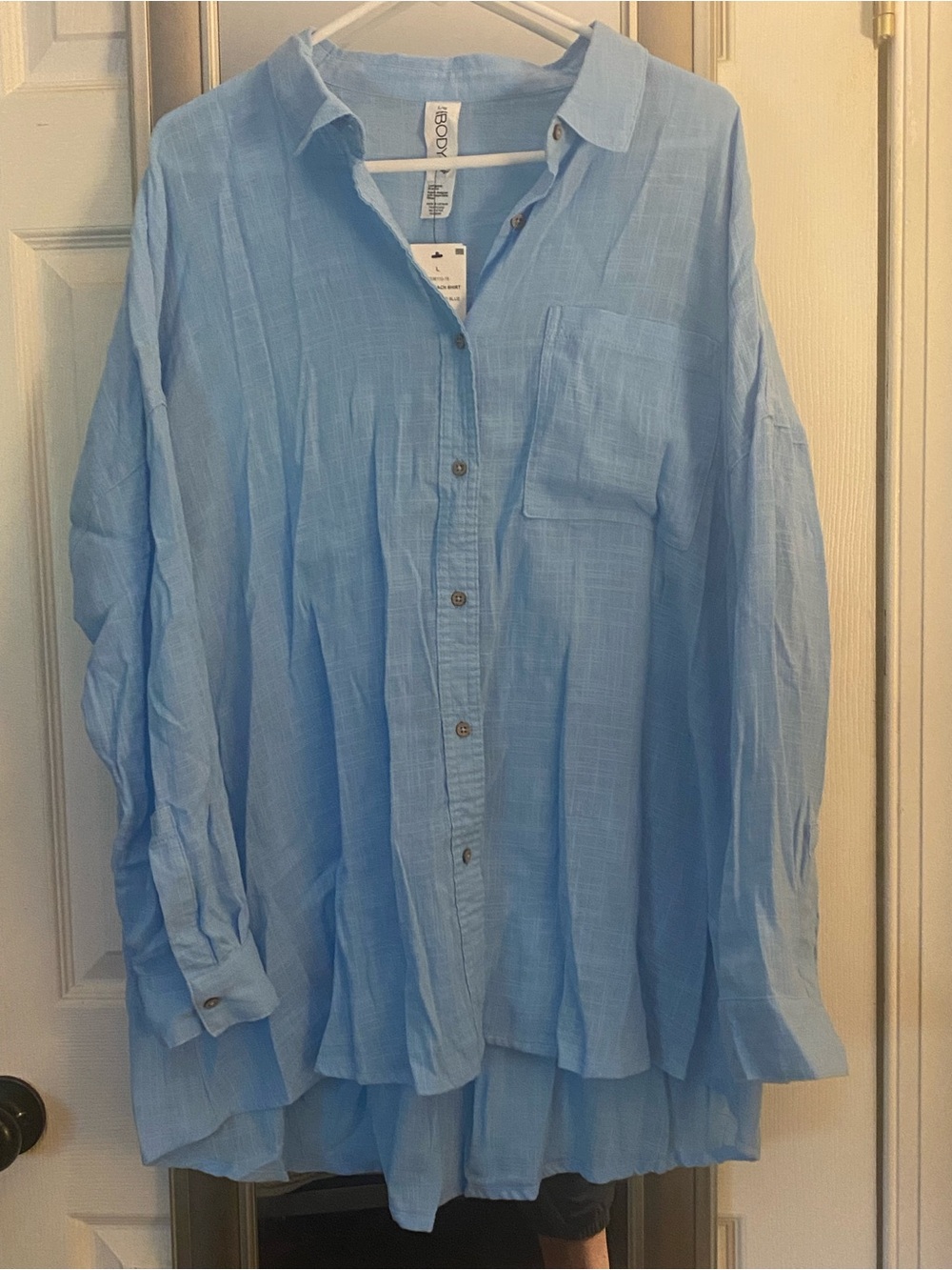 Beautiful shade of blue bathing suit cover up. NWT size L